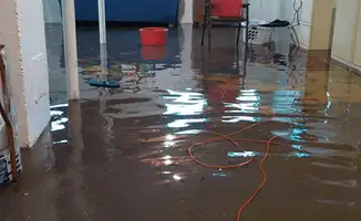 Basement with boiler, cabinets and washing machine completely flooded in Columbia, MO