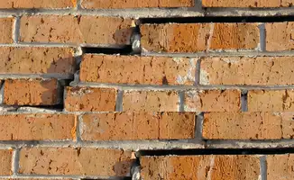 Brick wall with serious structural damage in Columbia, MO